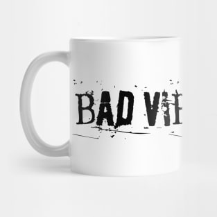 BAD VIBES ONLY grunge black text Mug